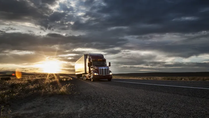3 4 front view of a commercial truck on the road 2026 09 24 12 00 00 utc